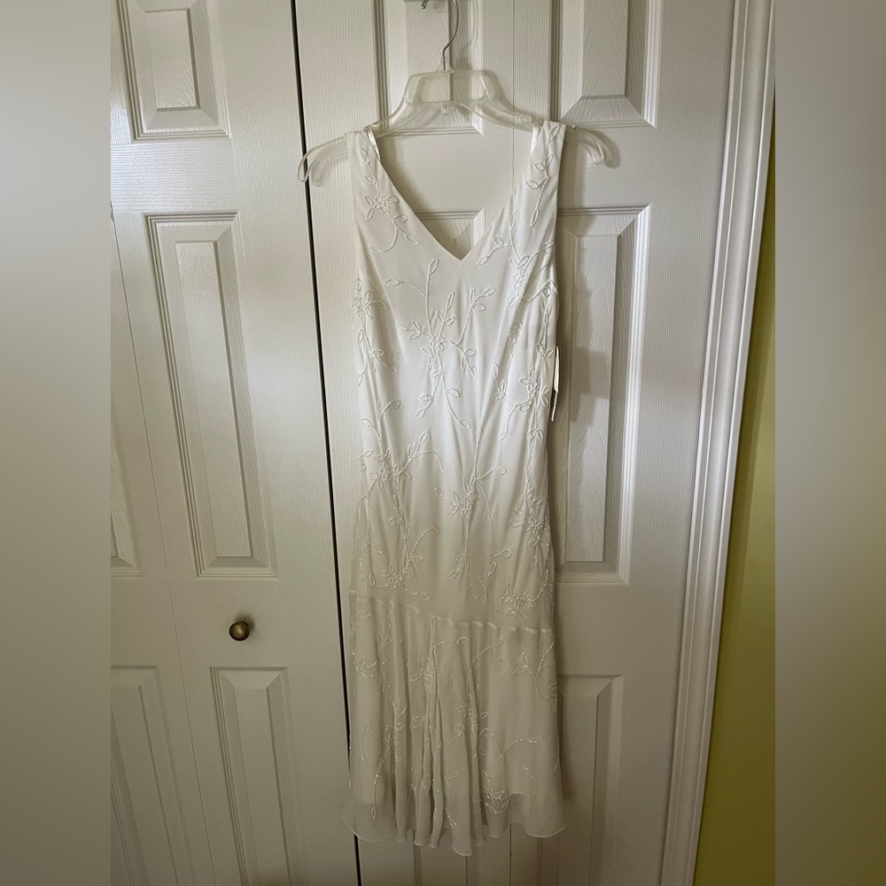 Ladies cream beaded dress, size 14